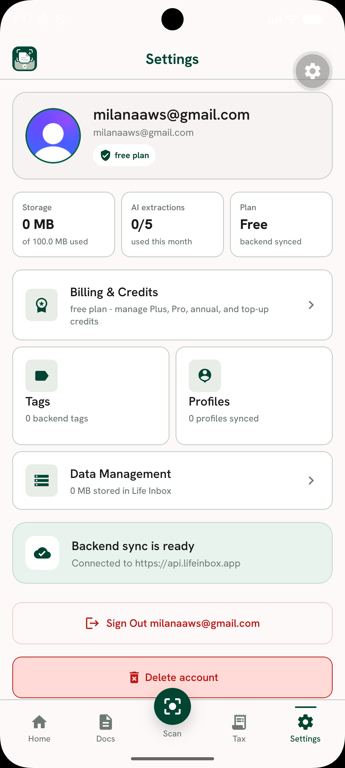 Settings screen showing storage used, AI extractions remaining, plan, a Billing & Credits row, data management, and account deletion controls